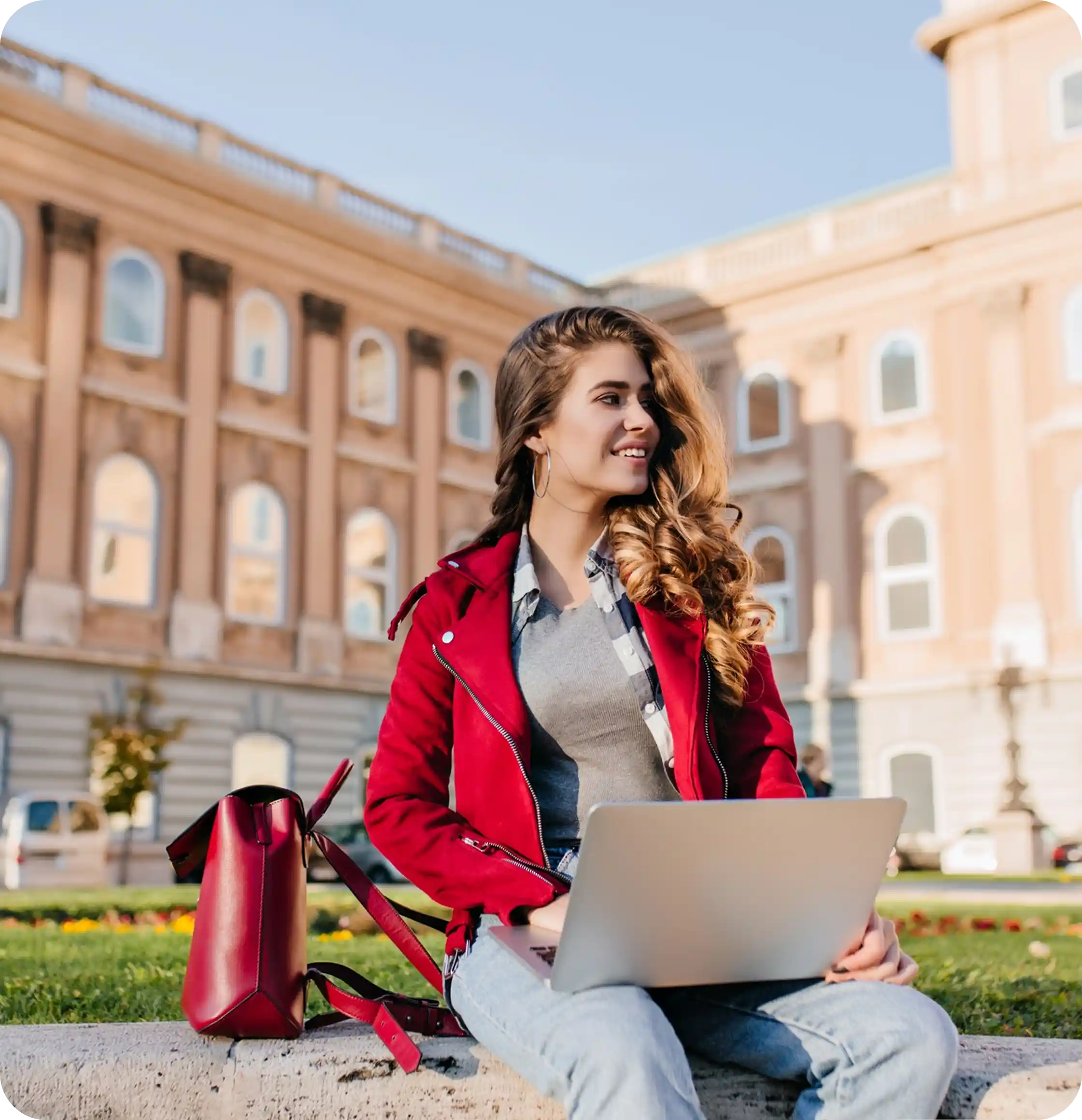 Student with laptop on campus